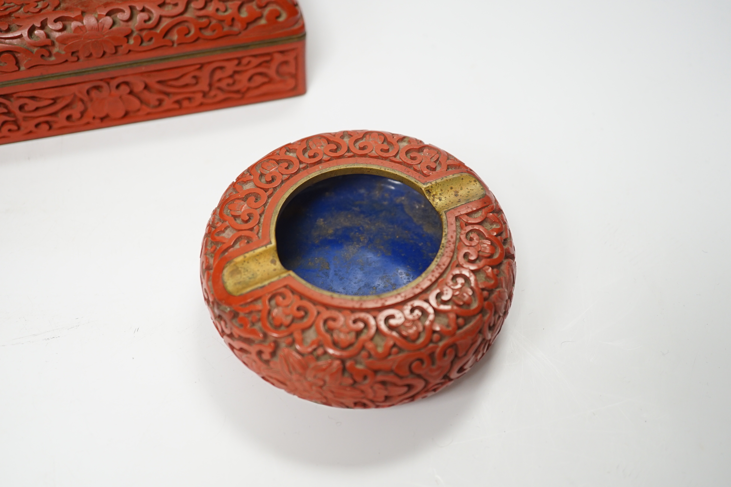 Three Chinese cinnabar lacquer items, a vase, an ashtray and a lidded box, vase 16.5cm